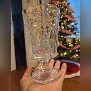 Vintage glass goblet, with 3D Christmas carving, transparent iridescent.